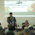 Pj Bupati Aceh Timur Amrullah M Ridha membuka acara Sosialisasi Program Pendampingan Petani Kakao, di aula Bappeda Aceh Timur